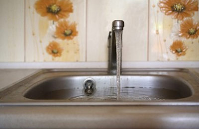 How to Prevent Water Damage Caused by a Clogged Kitchen Sink